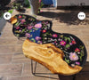 Handmade irregular shape floral table on black reisn